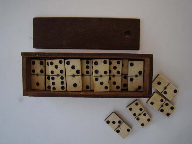 A complete set of Civil War era bone and ebony dominoes circa 1860-1870